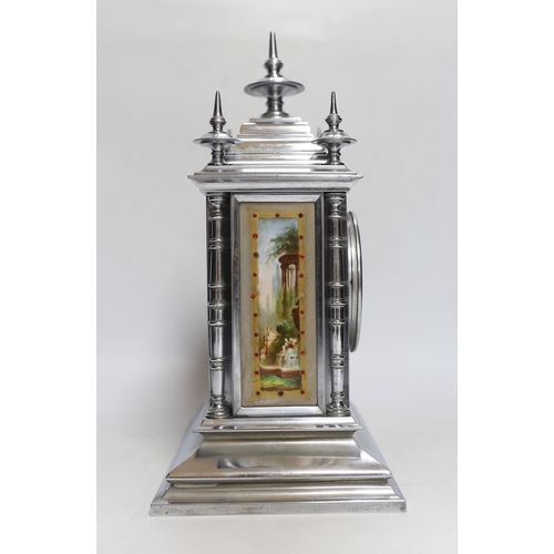 324 - A French chrome plated mantel clock, with jewelled porcelain inset panels 32cm