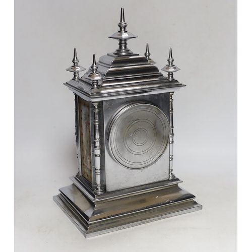 324 - A French chrome plated mantel clock, with jewelled porcelain inset panels 32cm