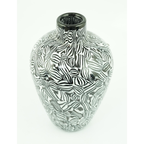 325 - ** ** Vittorio Ferro (1932-2012) A Murano glass Murrine vase, in black and white, unsigned, 25cmPlea... 