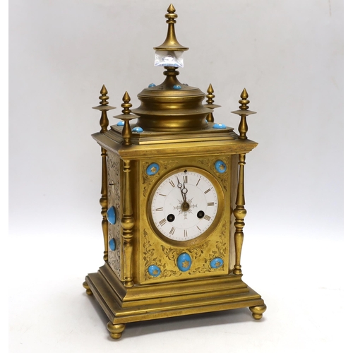 338 - A brass French mantel clock (missing bell and pendulum), 35cm high