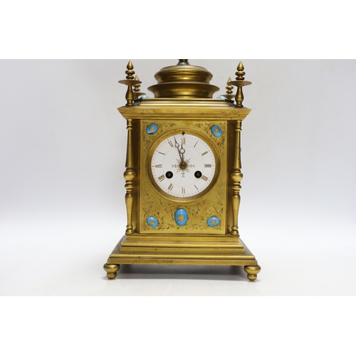 338 - A brass French mantel clock (missing bell and pendulum), 35cm high