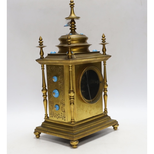 338 - A brass French mantel clock (missing bell and pendulum), 35cm high