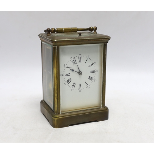 341 - A 19th century French brass carriage clock with repeater, 17cm high