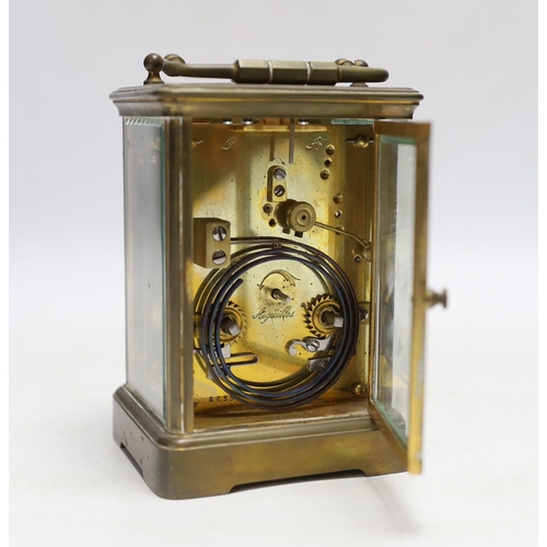 341 - A 19th century French brass carriage clock with repeater, 17cm high