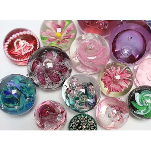 345 - A group of glass paperweights including Caithness