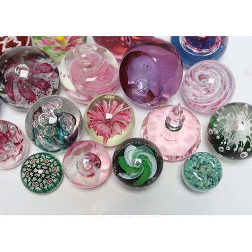 345 - A group of glass paperweights including Caithness