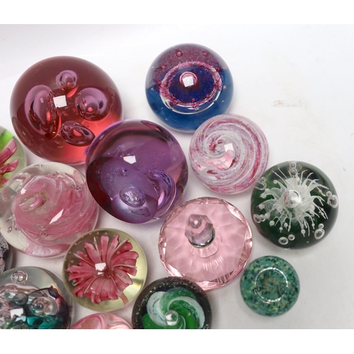 345 - A group of glass paperweights including Caithness