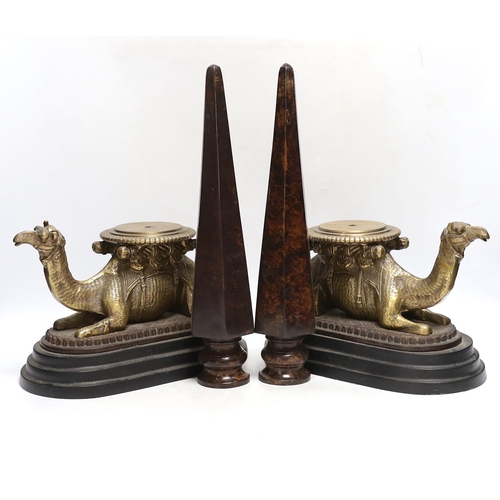 347 - A pair of camel and obelisk side ornaments raised on tapered bases, 51cm high