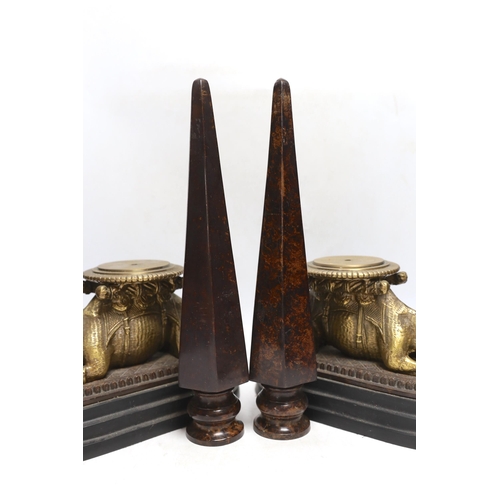 347 - A pair of camel and obelisk side ornaments raised on tapered bases, 51cm high