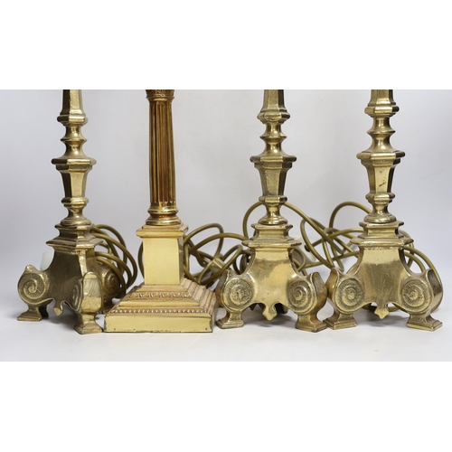 372 - Four brass column lamps including a set of three, largest each 44cm high