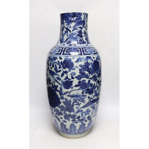 379 - A large Chinese blue and white birds amid foliage vase, late 19th century, 54cm