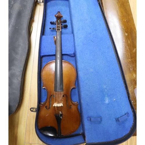 383 - One violin, three violin cases and a cased set of bagpipes