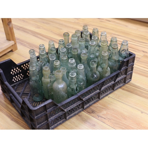 388 - A quantity of early to mid 20th century glass bottles