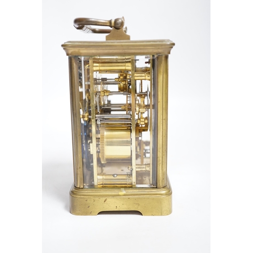 394 - A late 19th century French brass cased eight day carriage clock with incorporated alarm mechanism, r... 