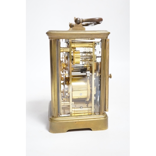 394 - A late 19th century French brass cased eight day carriage clock with incorporated alarm mechanism, r... 