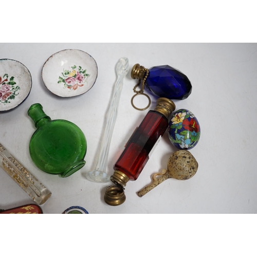 424 - A collection of scent bottles, a miniature antiquity vessel and a miniature of a lady