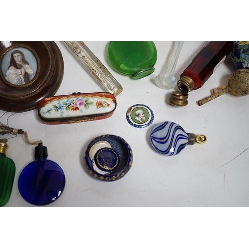 424 - A collection of scent bottles, a miniature antiquity vessel and a miniature of a lady