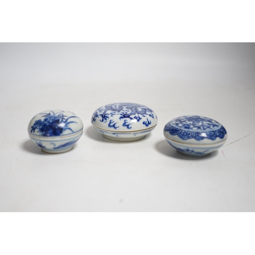 425 - Three Chinese blue and white seal paste boxes and covers, Qing dynasty, largest 7cm in diameter... 