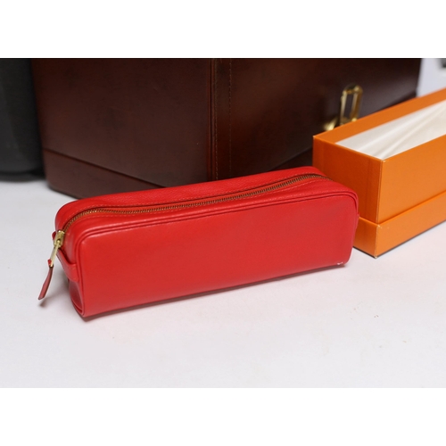 442 - Hermes boxed red leather pen case, a Samsonite black hard plastic overnight case and a brown leather... 