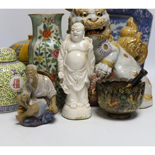 443 - A collection of mostly Chinese ceramics, to include a vase, a lion dog, etc. blue and white dish 26c... 