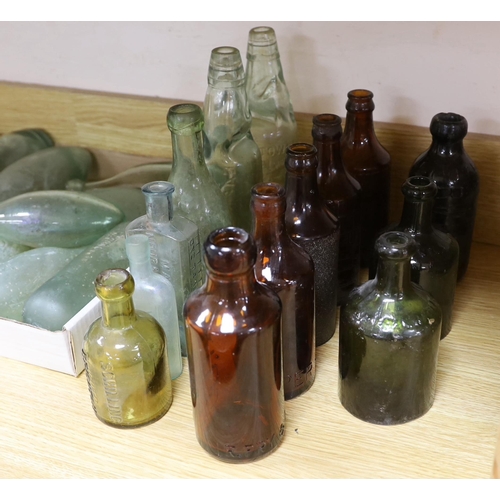 448 - A quantity of early to mid 20th century glass bottles