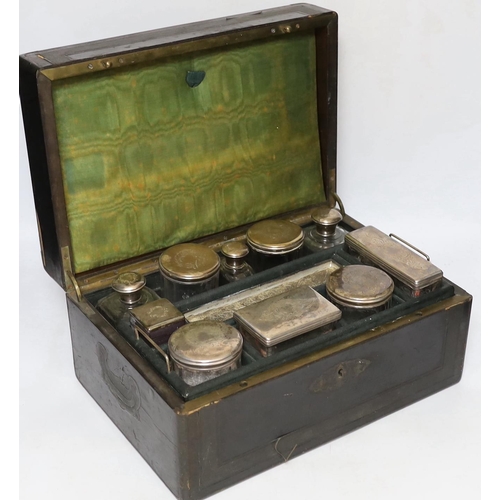 452 - A Victorian vanity case with silver lidded jars, 35cm wide