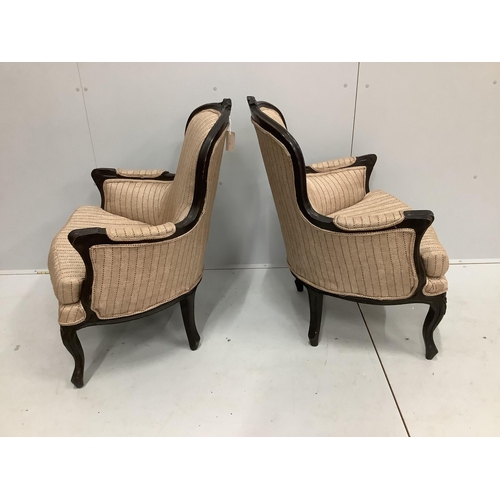 55 - A pair of 19th century French ebonised spoonback armchairs, width 70cm, depth 58cm, height 92cm... 