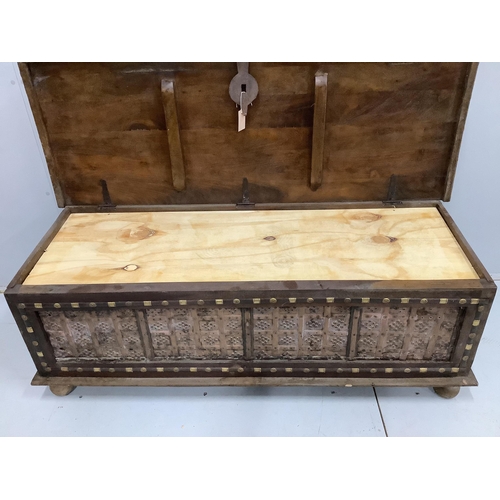 70 - A Zanzibar style brass mounted hardwood coffer, width 145cm, depth 55cm, height 49cm