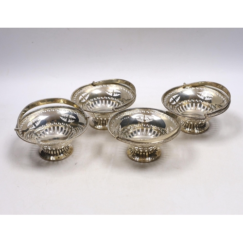 832 - A set of four Edwardian pierced silver circular bonbon baskets, William Neale, Birmingham, 1908, 10c... 