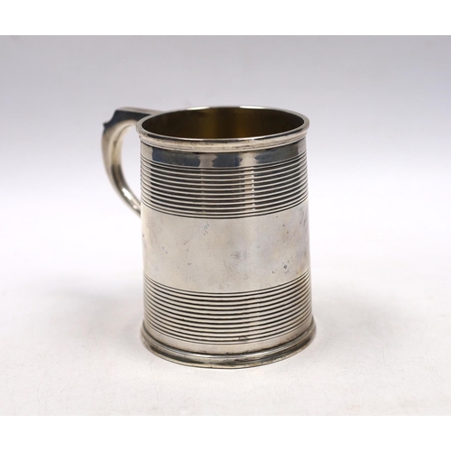 837 - A Victorian reeded silver christening mug, William Evans, London, 1878, 87mm.