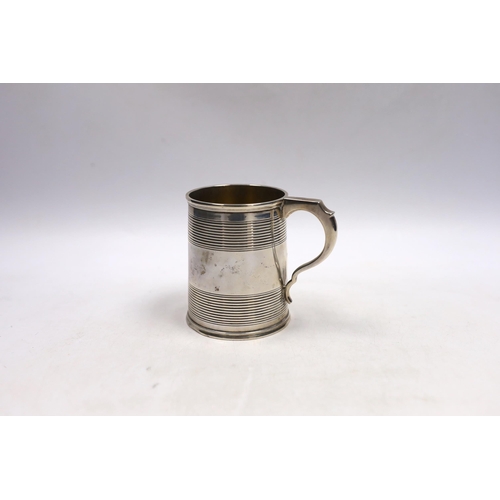 837 - A Victorian reeded silver christening mug, William Evans, London, 1878, 87mm.