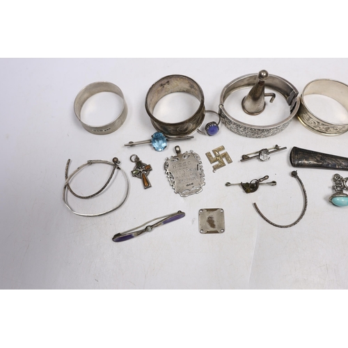 839 - Small silver and other items including napkin rings, bracelets, 19th century vinaigrette, medals, et... 