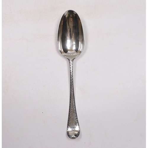 840 - A late George II? bright cut engraved base mark table spoon, marks pinched and rubbed, 20.3cm, 64 gr... 