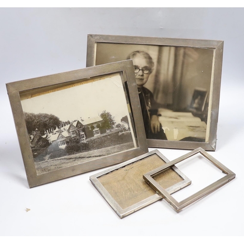 845 - Four assorted early to mid 20th century silver mounted rectangular photograph frames, largest 28.6cm... 