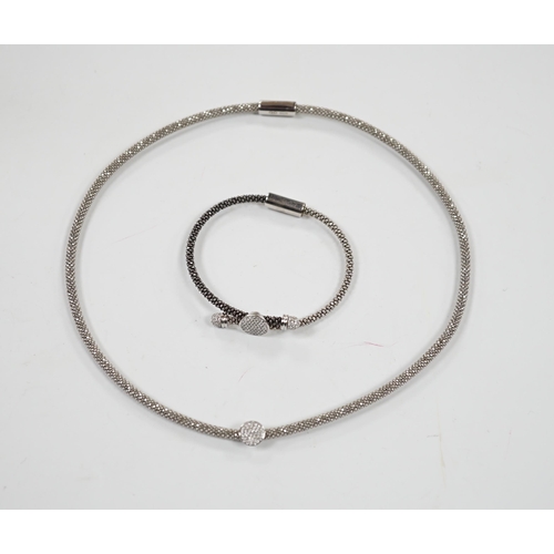 957 - A modern Links of London, silver necklace with diamond cluster motif and a similar bracelet, in Link... 