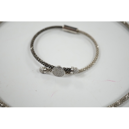 957 - A modern Links of London, silver necklace with diamond cluster motif and a similar bracelet, in Link... 