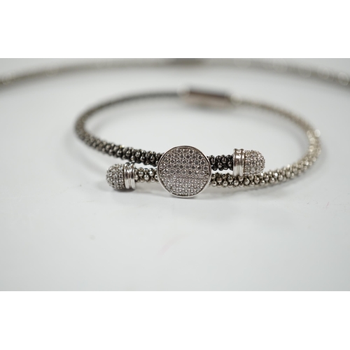 957 - A modern Links of London, silver necklace with diamond cluster motif and a similar bracelet, in Link... 