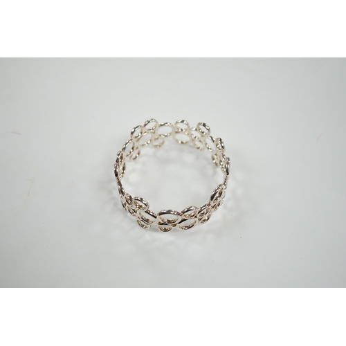 961 - A modern Links of London silver circles bangle, interior diameter 61mm, in Links of London box.... 