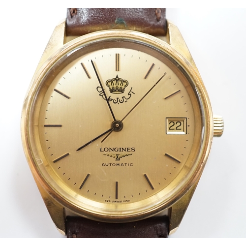 968 - A gentleman's steel and gold plated Longines Automatic wrist watch, the dial with King Hussein of Jo... 