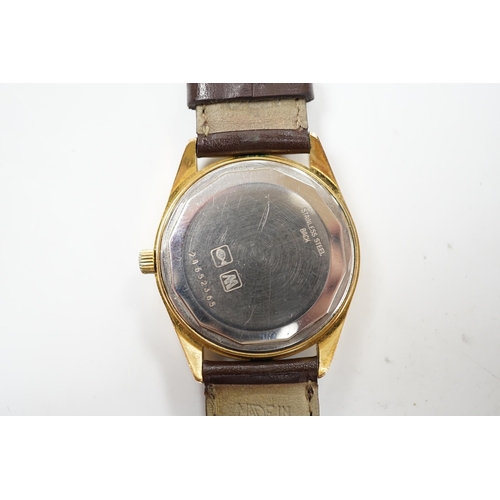 968 - A gentleman's steel and gold plated Longines Automatic wrist watch, the dial with King Hussein of Jo... 