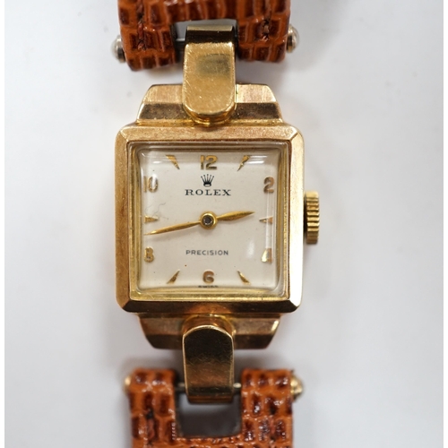 975 - A lady's 1950's 9ct gold Rolex manual wind wrist watch, on later associated leather strap.