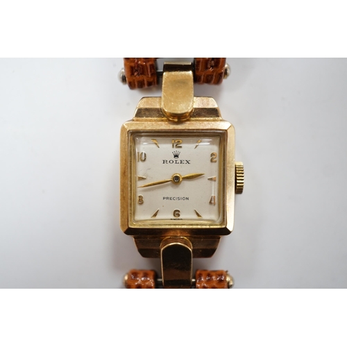 975 - A lady's 1950's 9ct gold Rolex manual wind wrist watch, on later associated leather strap.