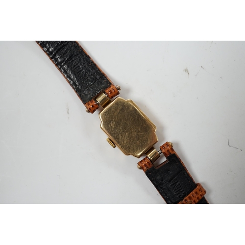 975 - A lady's 1950's 9ct gold Rolex manual wind wrist watch, on later associated leather strap.