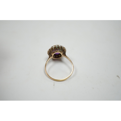 979 - A mid 20th century 14k yellow metal, amethyst and seed pearl set circular cluster ring, size U/V, gr... 