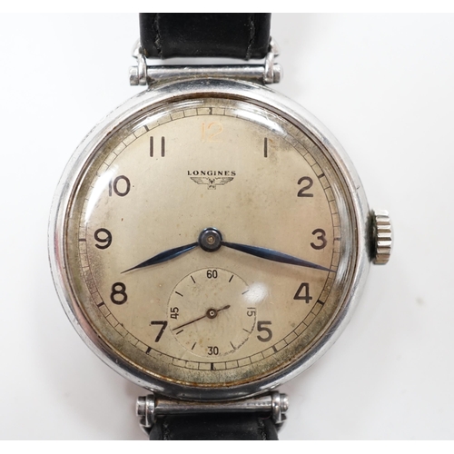 980 - A gentleman's 1930's stainless steel Longines manual wind wrist watch, with Arabic dial and subsidia... 