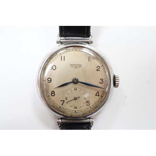 980 - A gentleman's 1930's stainless steel Longines manual wind wrist watch, with Arabic dial and subsidia... 