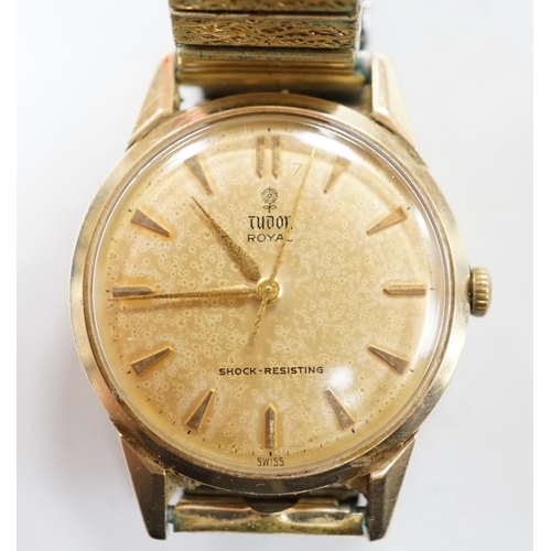 984 - A gentleman's yellow metal Tudor Royal manual wind wrist watch, with baton numerals, on an associate... 