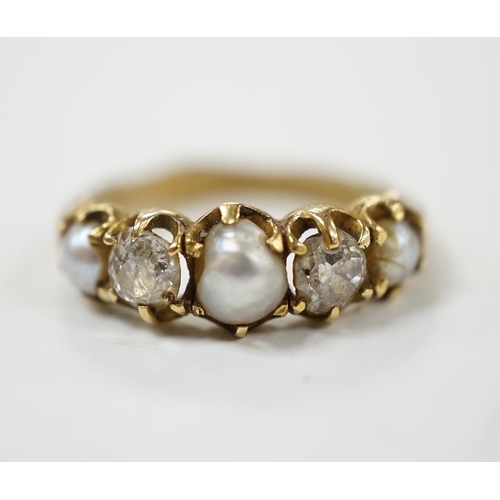 985 - A late Victorian yellow metal and graduated three stone split pearl and two stone diamond set half h... 