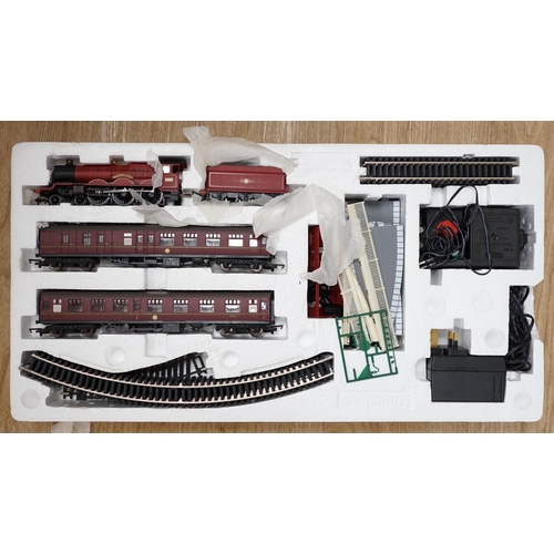 1257 - A Hornby 00 gauge Hogwarts Express Electric Train Set (R1033) from Harry Potter and the Chamber of S... 