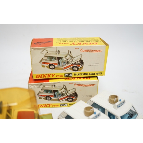 1261 - Five boxed Dinky Toys; Rover 75 Saloon (156) in correct two-tone green colour spot box, two Police P... 